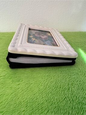 Vintage 1990s style Liz Claiborne Realities ceramic cover photo album.